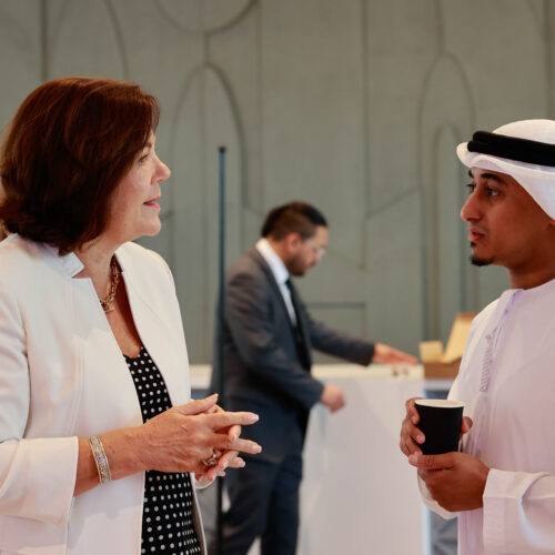 two investers talking in corporate event