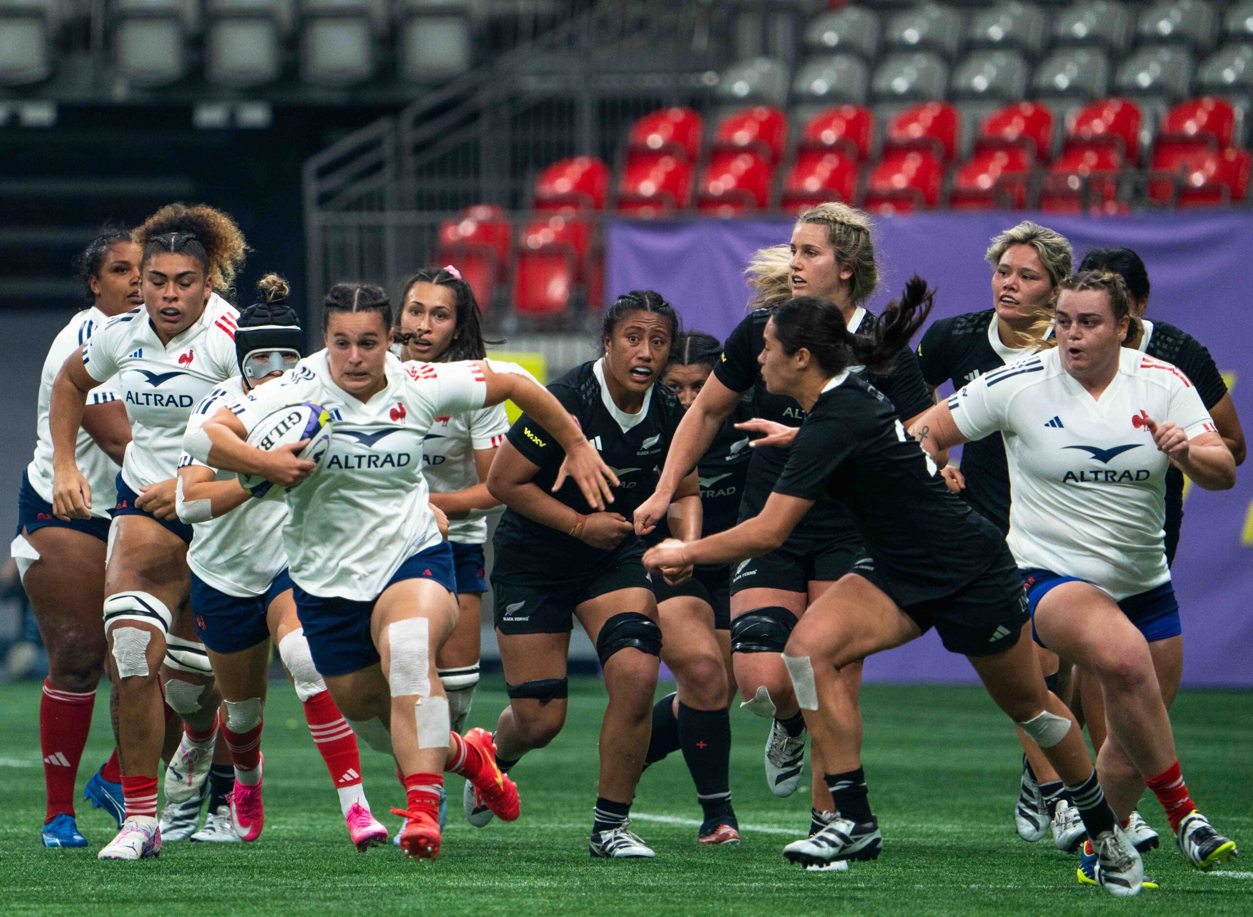 France Women's Rugby team attacking at pace against the New Zealand defense during WXV.