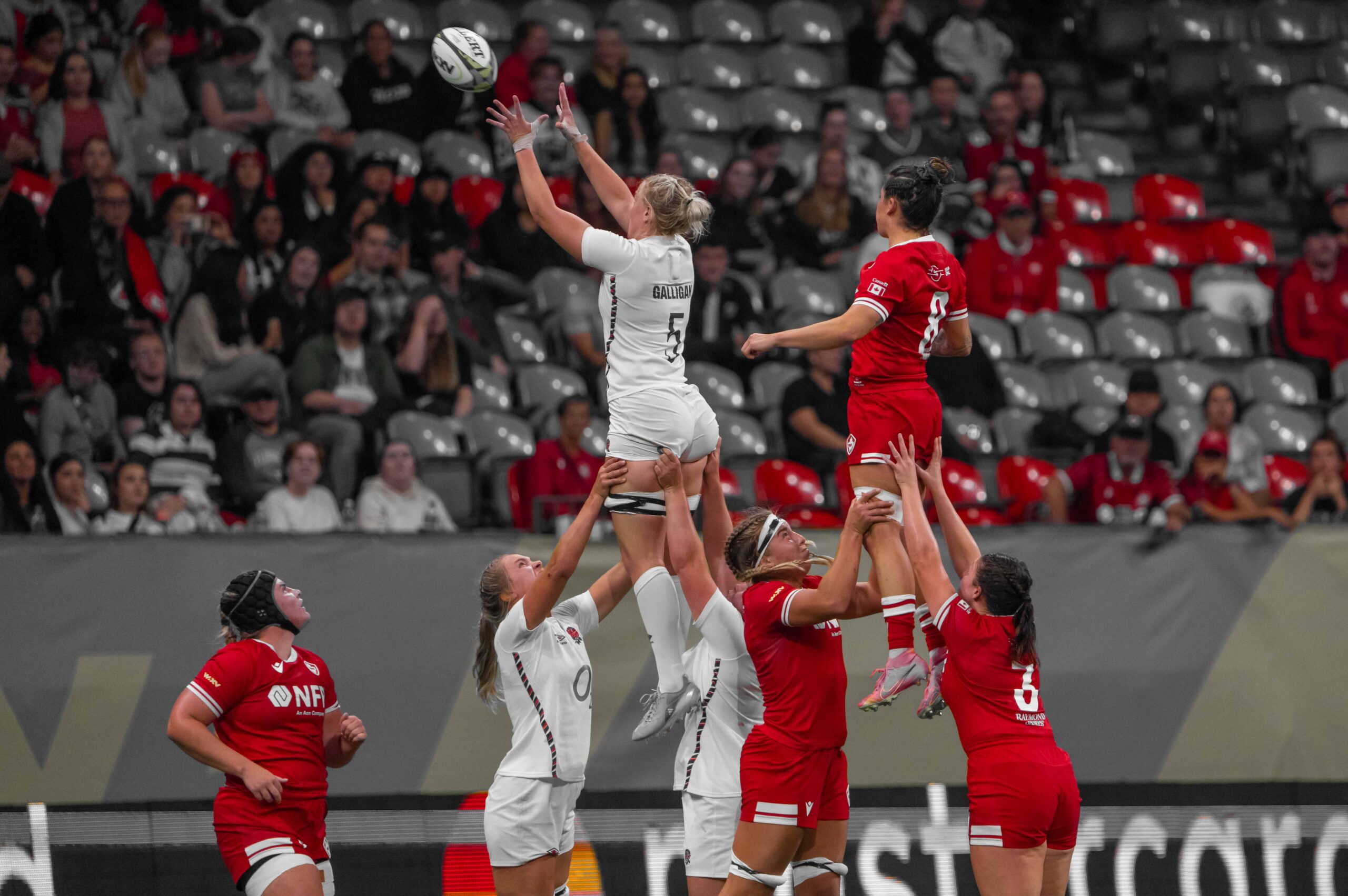 England's Rosie Galligan (5) being lifted in a lineout contest against Canada Women's Rugby.